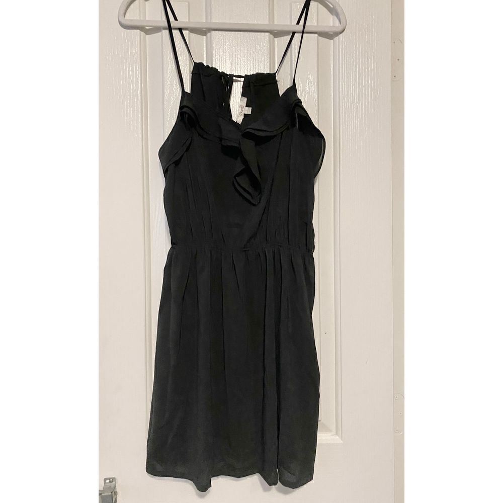 Black sundress with three silver buttons￼
